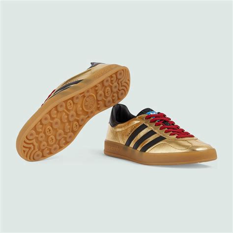 adidas x gucci gazelle metallic gold.